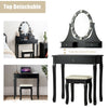 Black vanity dressing table set with 360-degree rotatable mirror, 3 drawers, and cushioned stool for comfortable makeup.