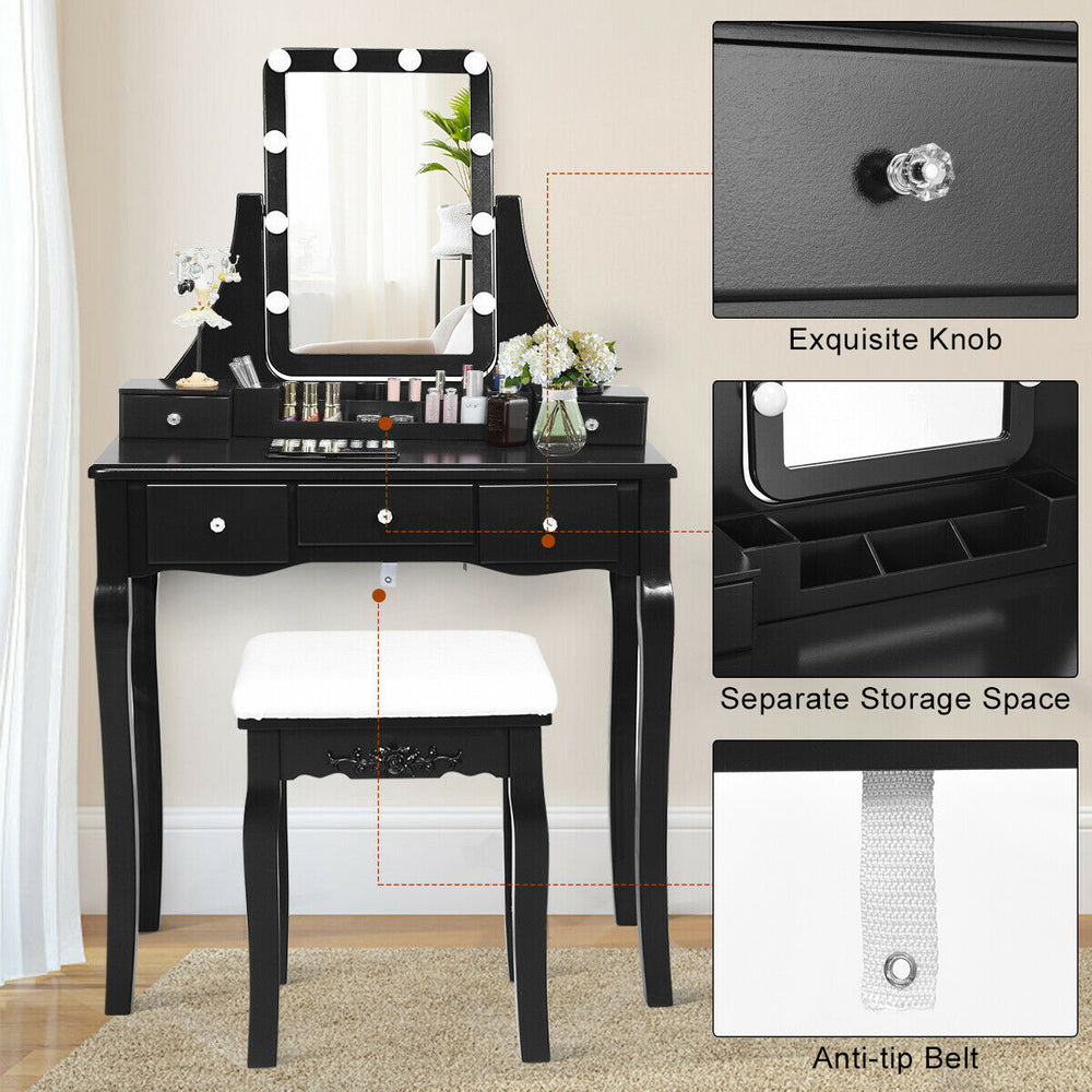 Vanity dressing table in black with 10 dimmable light bulbs, cushioned stool, and ample storage for cosmetics.