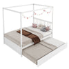 Full size white canopy bed with trundle, solid wood frame, decorated with lights, ideal for kids' bedrooms.
