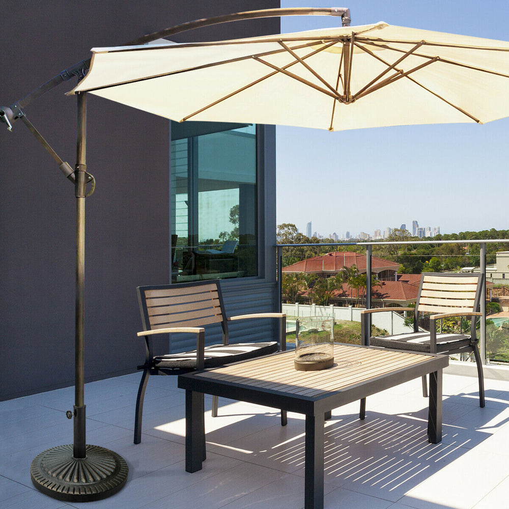 Heavy-duty bronze umbrella base with petaloid hand-turn knob, ideal for outdoor patios and gardens.