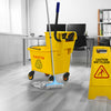 26 Quart side press wringer mop bucket in bright yellow with mop, designed for easy mobility and safety in commercial.