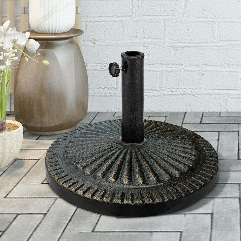 Heavy-duty 31.5 lbs bronze umbrella base with petaloid knob, ideal for outdoor patios and gardens.