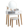 Vanity set featuring a touch-sensitive lighted mirror and spacious drawers, designed for organized makeup storage.