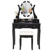Black vanity table set with lighted mirror, cushioned stool, and 5 drawers for ample storage in any space.