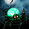 5-foot Halloween inflatable spider with glowing green body, red eyes, and cobweb, perfect for festive outdoor decor.