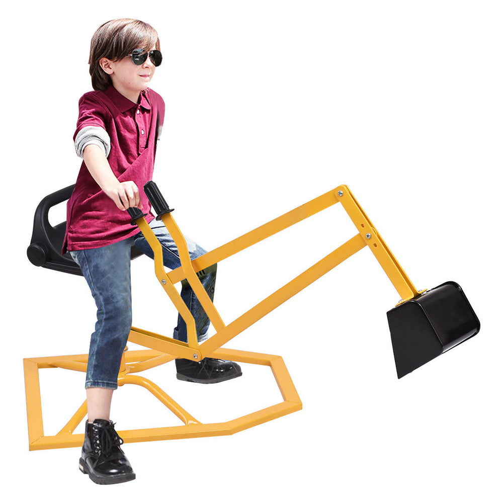 Child seated on a heavy-duty kid ride-on sand digging digger, showcasing the bright yellow design and rubber handle for.