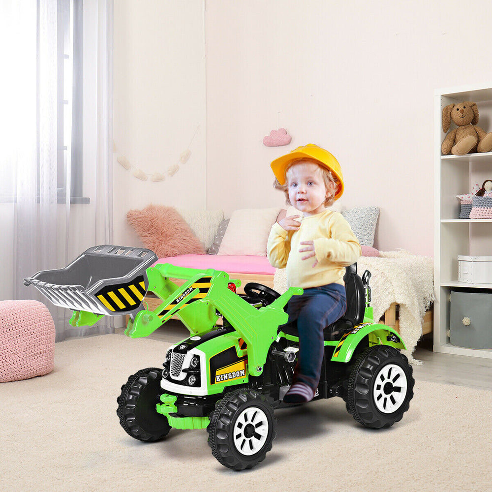 Child happily seated in a green 12V battery-powered kids ride-on dumper truck, ready for imaginative construction play.
