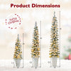 Set of 3 pre-lit snow flocked artificial Christmas trees in varying heights with warm white LED lights for festive.