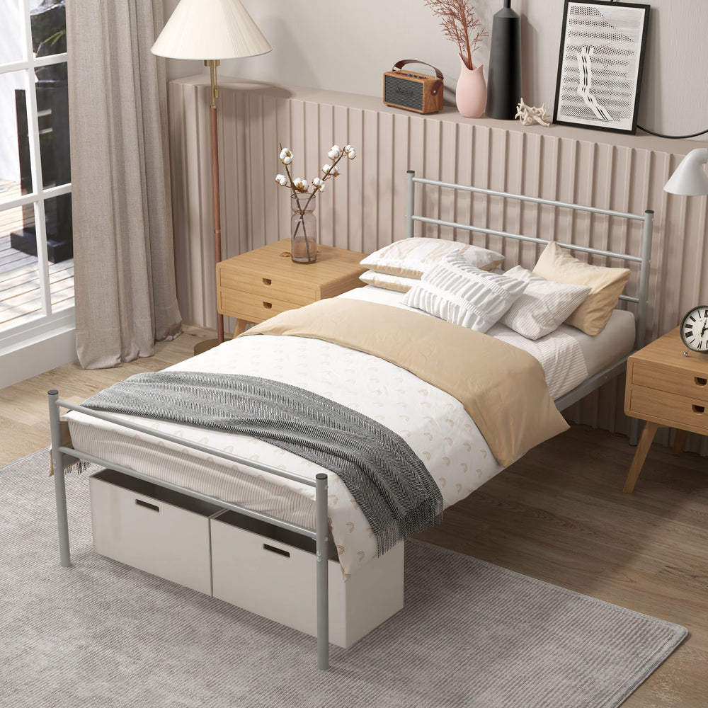 Twin size metal bed frame in silver with a modern headboard, showcasing sturdy construction and ample under-bed storage.