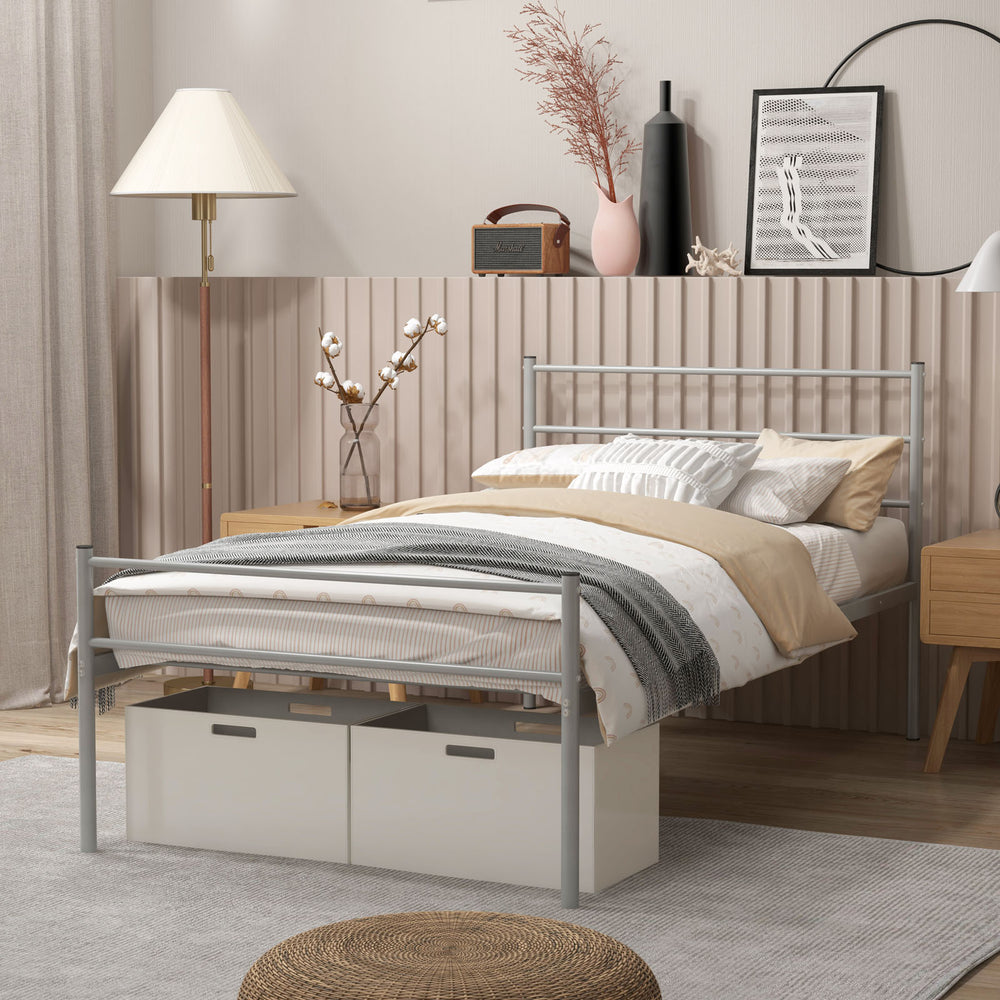 Twin size metal bed frame in silver, highlighting the minimalist headboard design and robust steel slats for mattress.