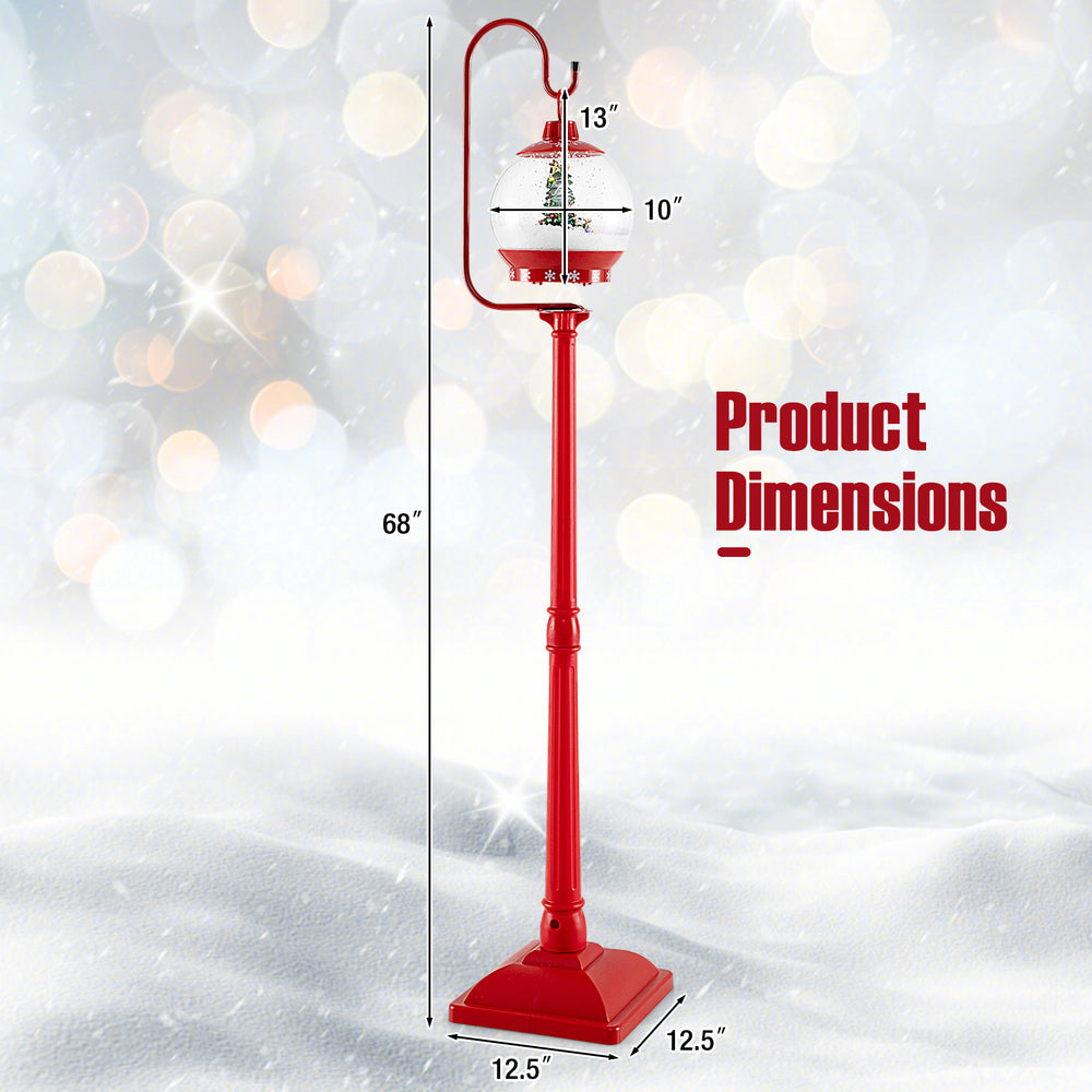 Festive 68-inch red musical street lamp post with snow globe lantern, featuring Christmas scene and colorful lights.