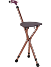 Lightweight adjustable folding cane seat in light brown with ergonomic handle, ideal for resting while traveling.