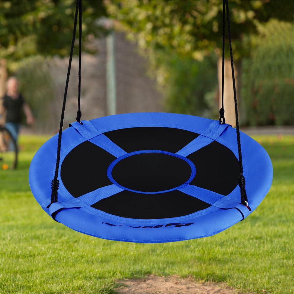 Blue 40-inch flying saucer tree swing shown hanging from a tree, providing a fun and safe outdoor play space for kids.