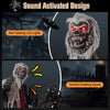 Standing animatronic werewolf with red flashing eyes, growling sounds, and poseable arms for Halloween yard decoration.