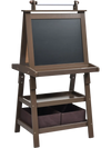 Double-sided brown art easel with chalkboard and whiteboard, featuring storage shelves and bins for kids' art supplies.