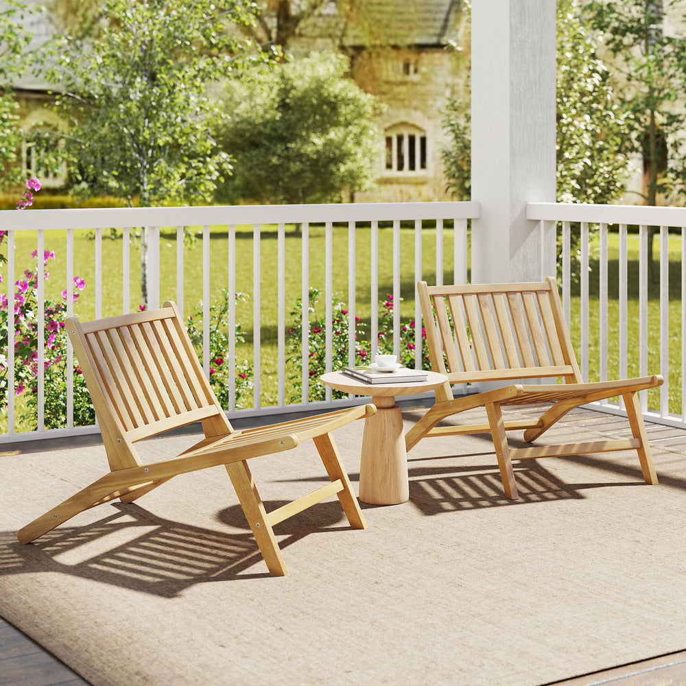 Teak wood outdoor reclining chairs with comfortable backrests, perfect for patios and backyards.