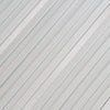 Close-up of the aluminum surface of a heavy-duty portable folding step ladder, designed for safety and stability.