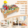 Double-sided wooden train set table with 100 accessories, designed for imaginative play and easy storage for kids.