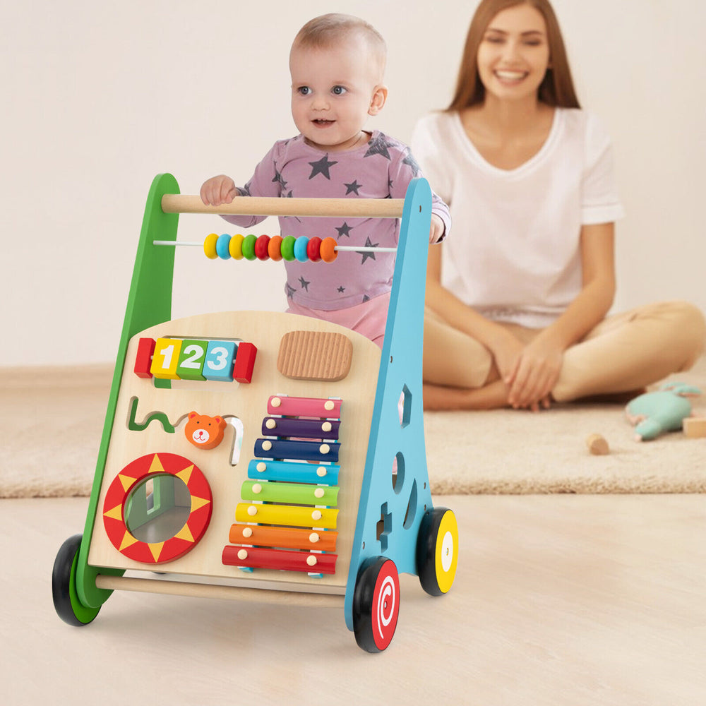 Toddler push walker activity center toy with multiple games, smooth handle, and premium rubber wheels for safe play.