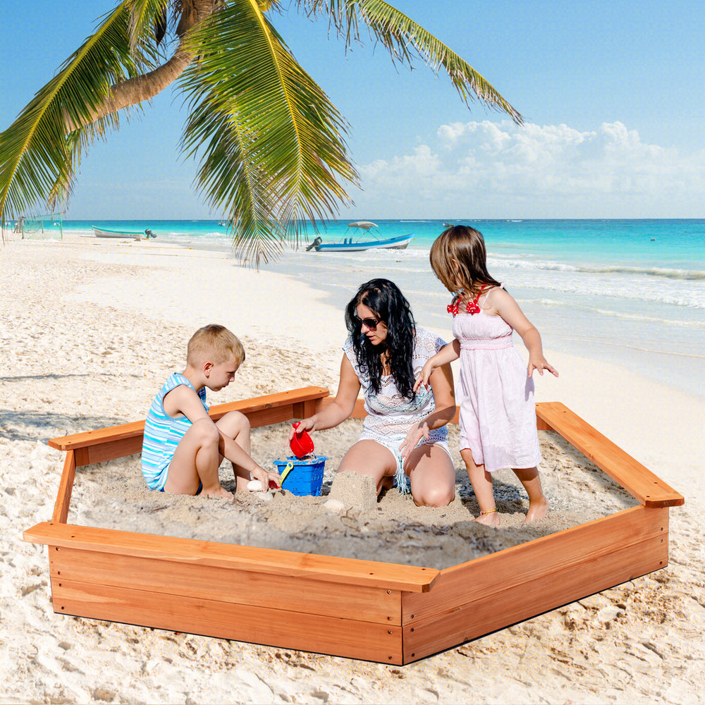 Hexagon wooden cedar sand box with seat boards, perfect for outdoor play, accommodating 4-6 kids on the beach.