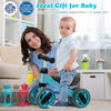 Baby balance bike in blue with 4 wheels, sturdy steel frame, and comfortable seat, ideal for toddlers aged 1-2 years.