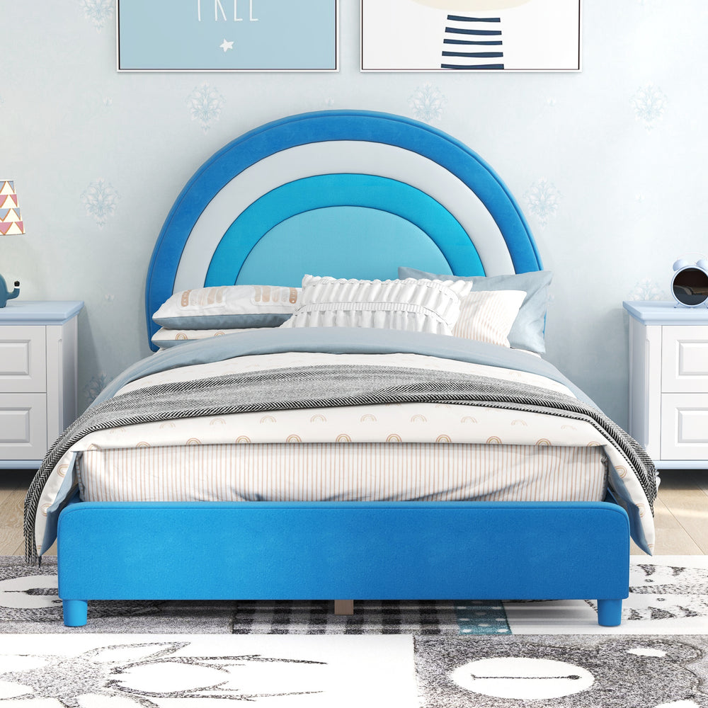 Twin bed frame in blue with a rounded headboard design and soft velvet fabric, offering a stylish touch for kids' rooms.