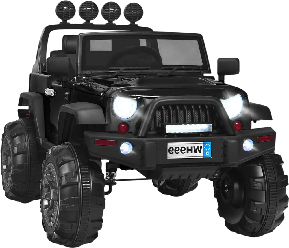 Close-up of the rugged wheels on the black 12V kids ride-on truck, designed for durability and smooth outdoor driving.