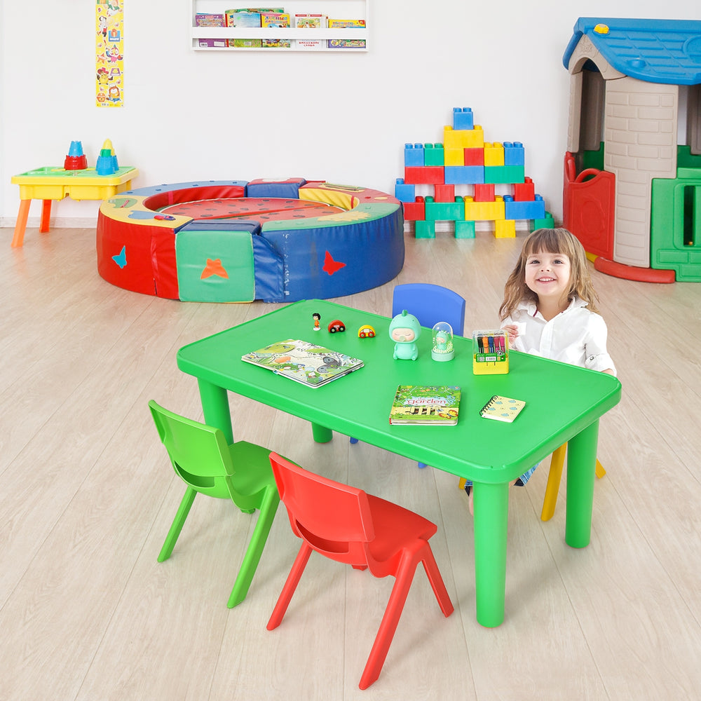 Colorful plastic table and 4 chairs set for kids, perfect for playtime and learning in vibrant colors.