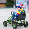 Child riding a green 4 wheel pedal powered ride-on with adjustable seat, designed for kids aged 3-6 years.