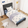 Upholstered twin platform bed with tufted headboard, faux linen fabric, and wooden slats in a modern bedroom setting.