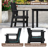 Black ergonomic patio dining chair with slanted high backrest and contoured seat, ideal for outdoor relaxation.