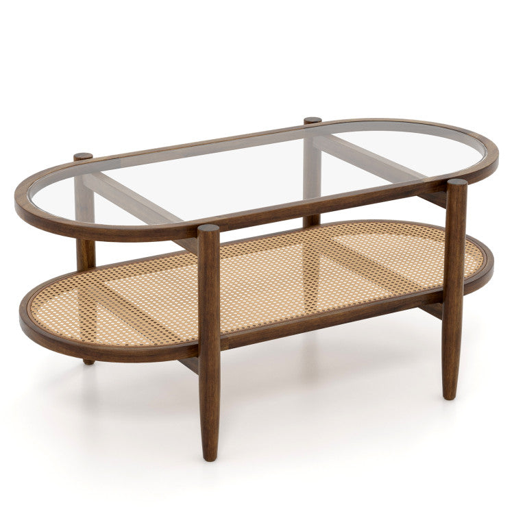 Two-tier coffee table with a glass top and rattan shelf, perfect for modern living room decor and functionality.