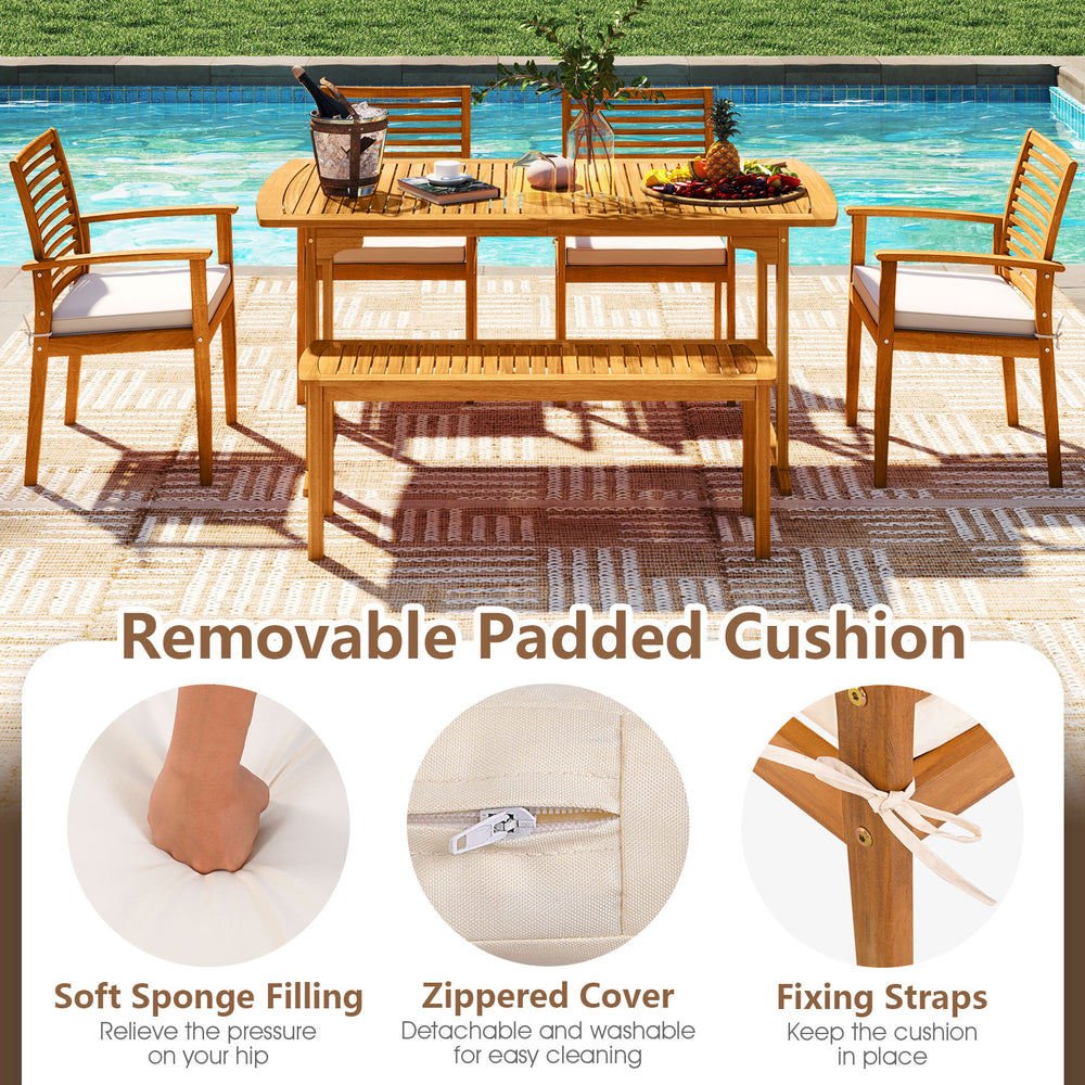 Acacia wood 7-piece patio dining set with removable padded cushions, ideal for outdoor gatherings and relaxation.