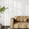 3D white PVC wall panels with diamond accents, perfect for DIY interior decoration in living rooms or offices.