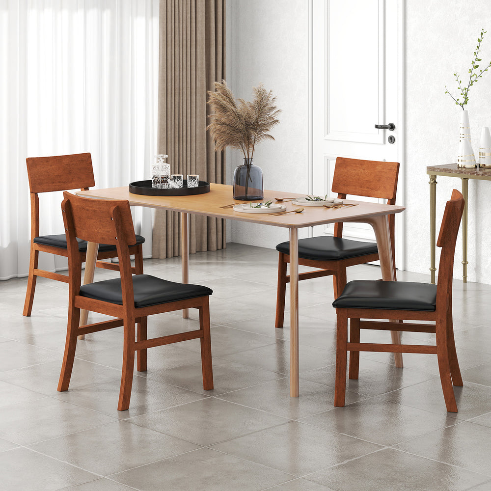 Set of 2 dining chairs with rubber wood legs and black faux leather seats, ideal for kitchen or dining room use.