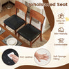 Set of 2 dining chairs with rubber wood legs and black PVC leather upholstered seats for comfortable dining.