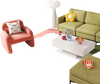 Accent chair in pink, modular L-shaped sectional sofa in blue, and LED coffee table in white for a stylish living room.