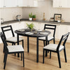 Round black dining table with rubber wood legs, ideal for 2-4 people, perfect for small spaces and elegant dining.