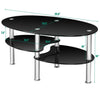 Tempered glass oval coffee table with metal legs, featuring two shelves, perfect for living rooms or studies.