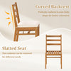 Curved backrest and slatted seat of an acacia wood dining chair, perfect for outdoor patio relaxation.