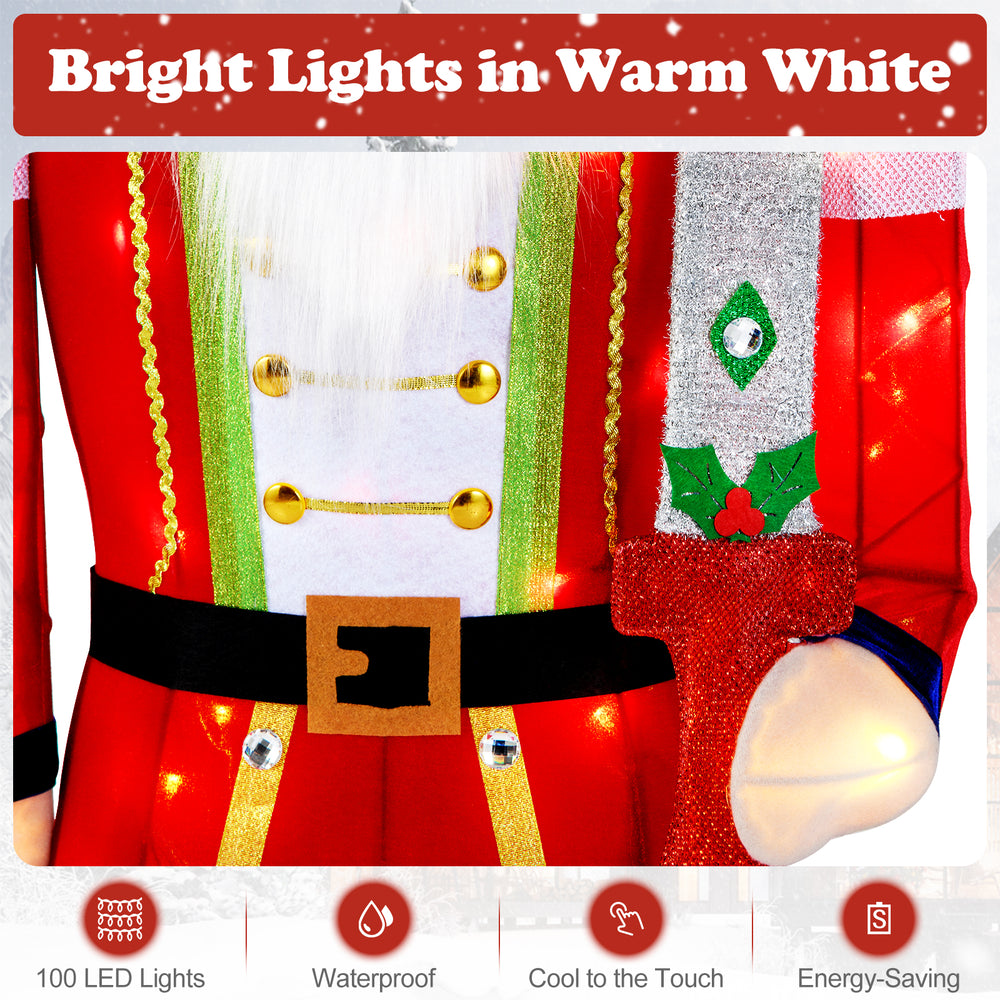 5 FT Christmas Nutcracker decoration with glitter sword, featuring 100 warm-white LED lights for festive outdoor.