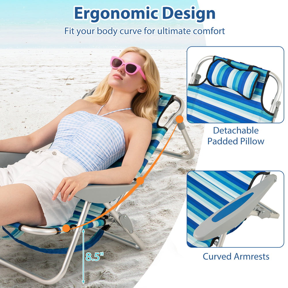 Folding beach chair with adjustable backrest, padded pillow, and curved armrests for ultimate comfort and easy.