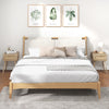 Modern rattan nightstand with drawer and solid wood legs, featuring a natural oak finish for bedroom or living room use.