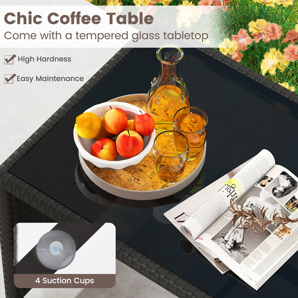 Chic coffee table with tempered glass tabletop, featuring a rattan surface and perfect for outdoor patio use.