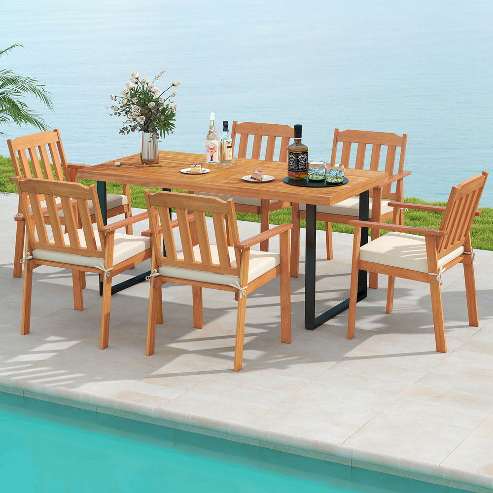 7-piece patio dining set featuring a 63” acacia wood table and 6 armchairs with removable cushions, ideal for outdoor.