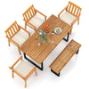 Patio dining set featuring a 63” acacia wood table, four armchairs, and a backless bench for outdoor gatherings.