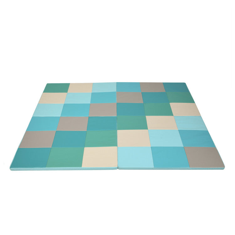 Colorful folding baby play mat featuring a patchwork design, made of waterproof PU for safe play and easy cleaning.