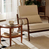 Single chair from the 3 Piece Rattan and Wood Living Room Set, featuring a beige cushion and wooden frame for stylish.