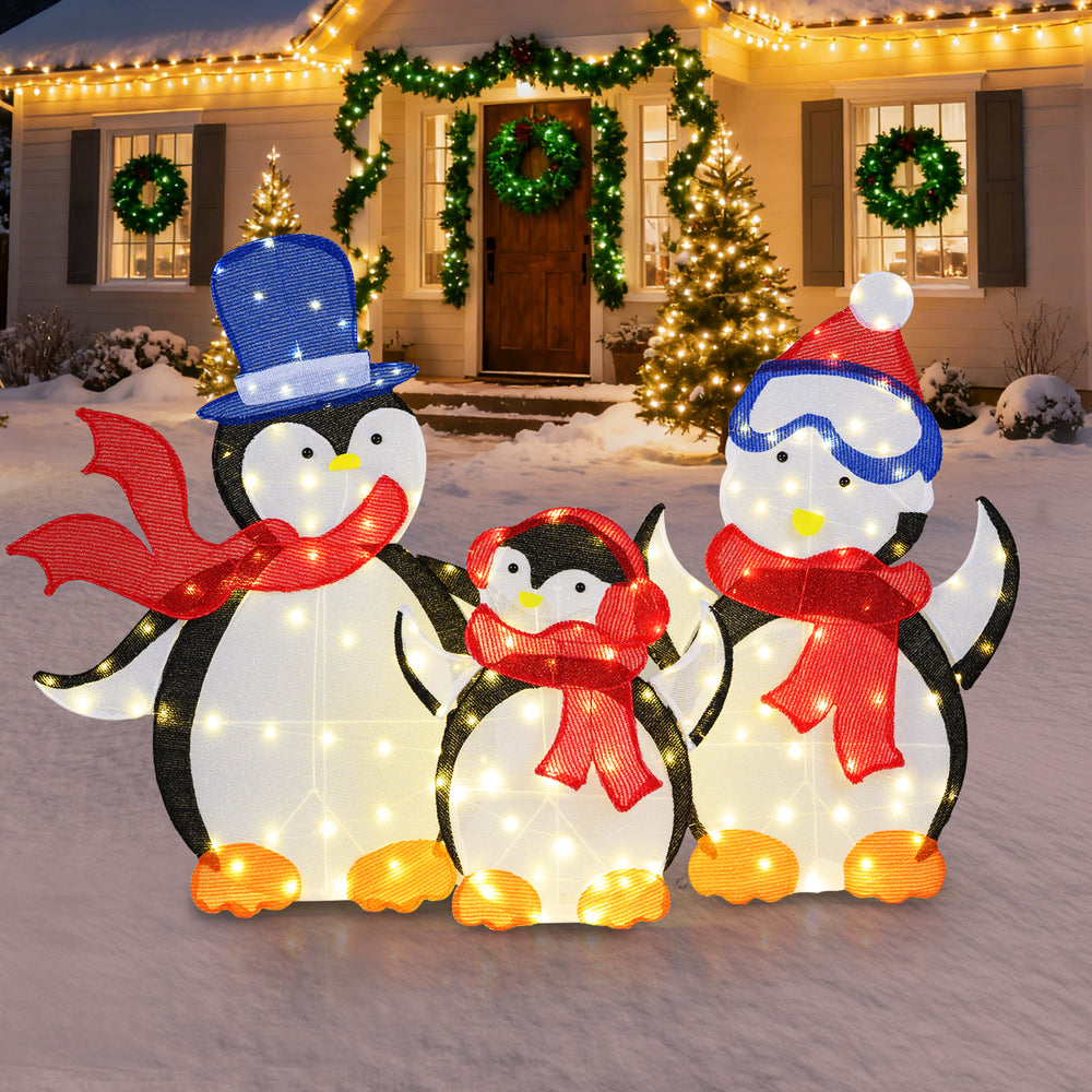 Lighted 3-piece penguin family Christmas decoration with 160 LED lights, featuring a dad, mom, and baby penguin in.