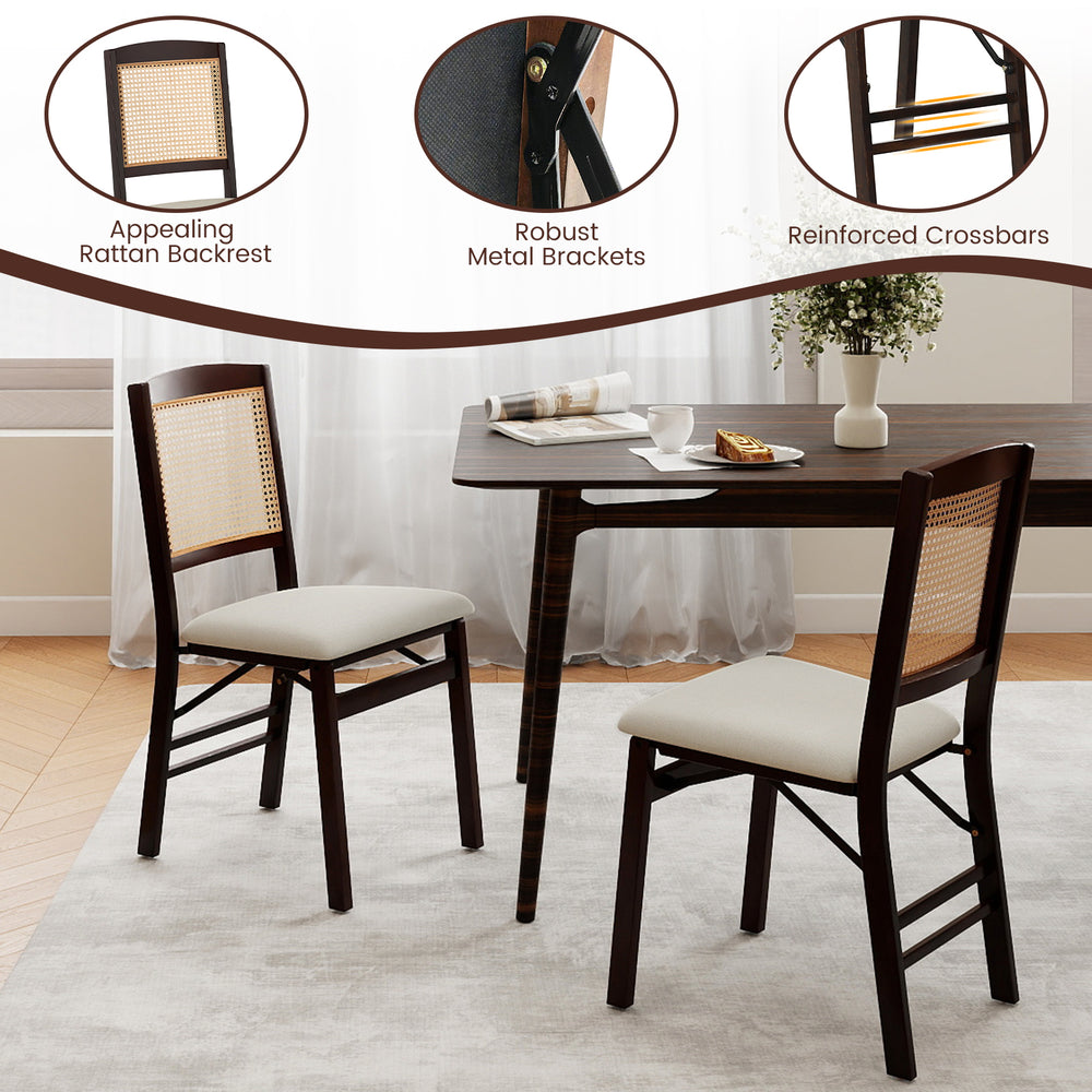 Set of 2 folding dining chairs with rubber wood frame, linen padded seats, and rattan backrest for stylish dining.